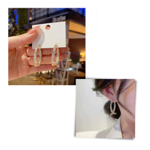 Load image into Gallery viewer, Pendientes cruzados de plata y oro - Ozerty